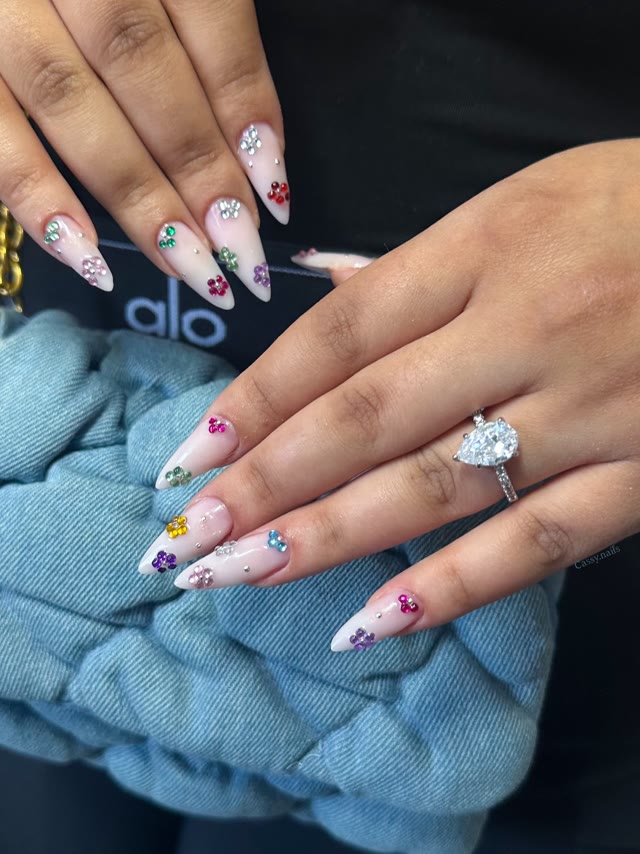 Almond nails with crystal flowers by Cassy Nails, Montreal